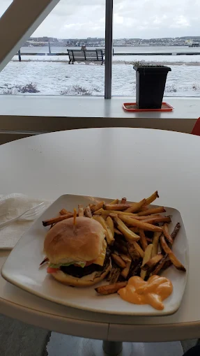 Burger and fries with a view of the Halifax harbour